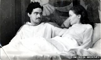 Douglass Clarke and Dorothy Adams appear in the 1938 SGW production of Othello. In a book celebrating the 60th anniversary of the first SGW graduating class of 1937 (of which Douglass was a member), Dorothy wrote of her future husband: “It was during this production that we became engaged in the most unromantic place you could imagine… in his office over the desk. A little peck on my brow sealed the deal.”